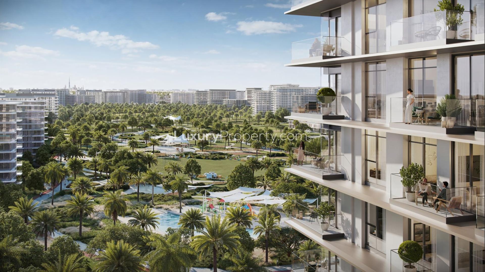 Modern entrance of Address Residences at Dubai Hills Estate with luxury car and palm trees