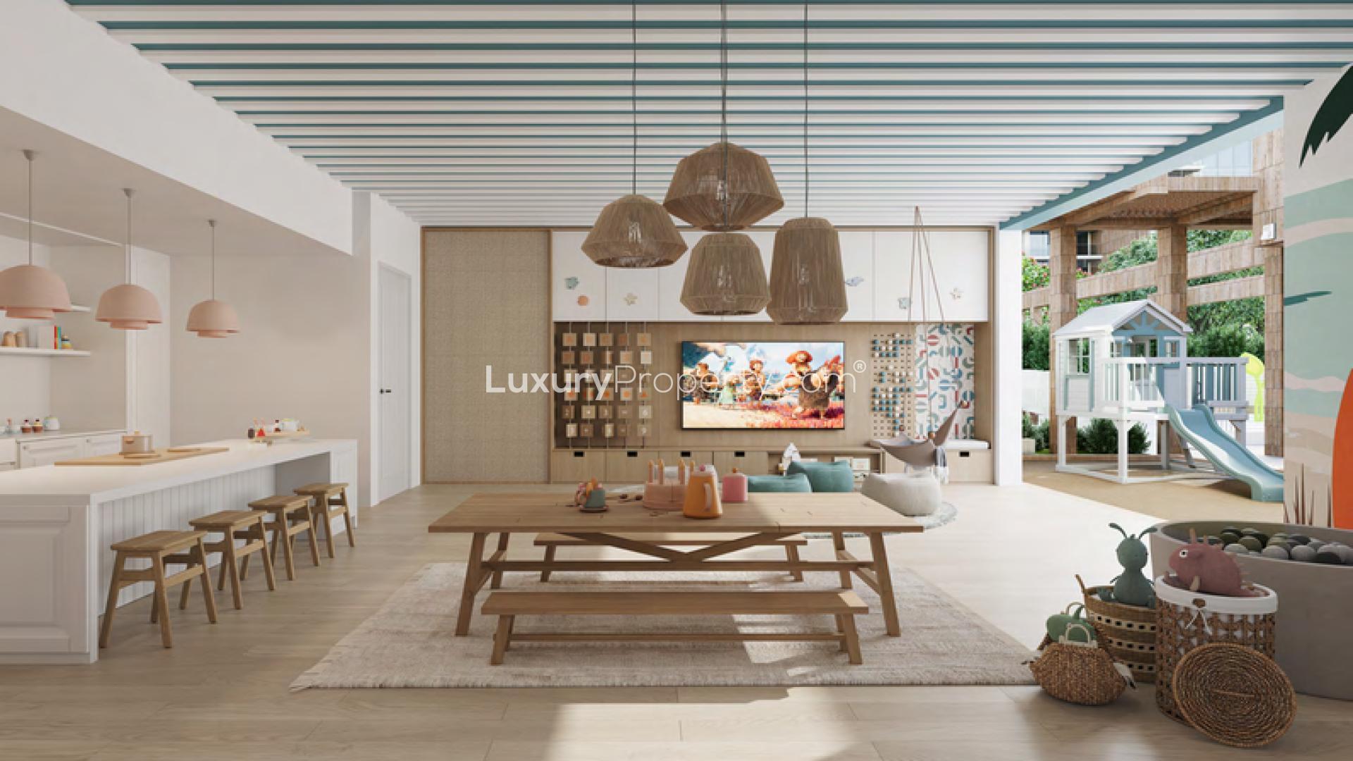 Luxurious open-plan living room and kitchen in Playa Del Sol apartment, Al Marjan Island