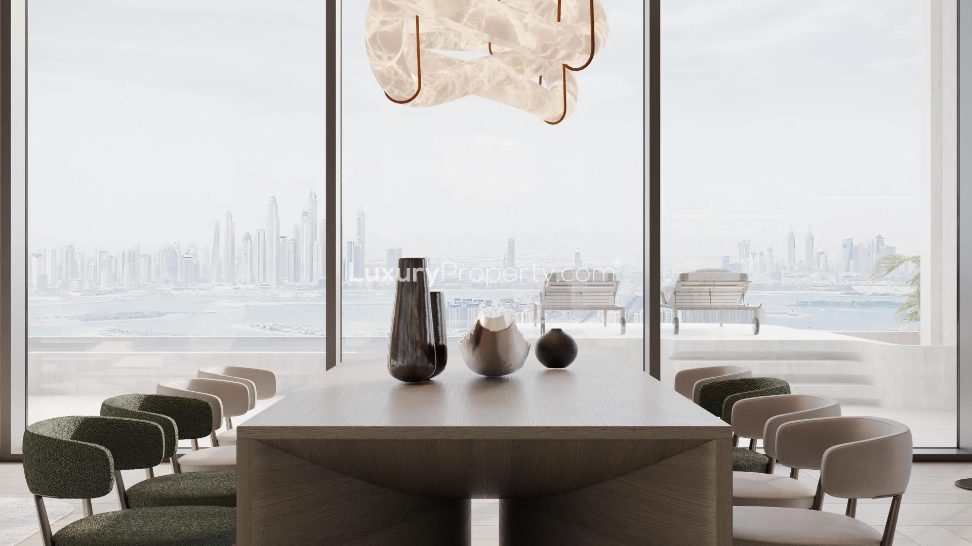Elegant dining area with stunning beach views at Alba Residences, Palm Jumeirah