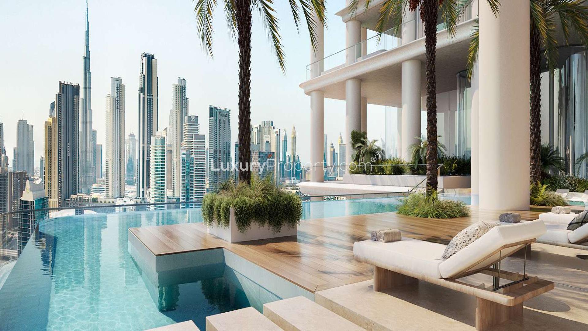 Luxurious bedroom with terrace view at VELA VIENTO, Business Bay, Dubai skyline visible