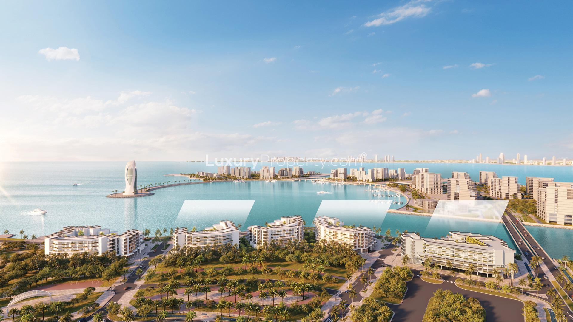 "Luxurious lobby of Les Vagues by Elie Saab in Qetaifan, Qatar's premier apartments.",Aerial view of Les Vagues by Elie Saab, Qetaifan, Qatar luxury waterfront apartments