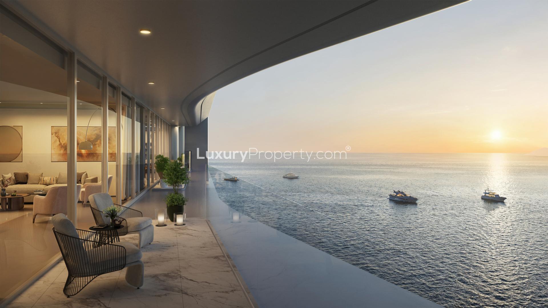 Luxurious balcony view from Trump Tower Jeddah apartment overlooking serene sea at sunset