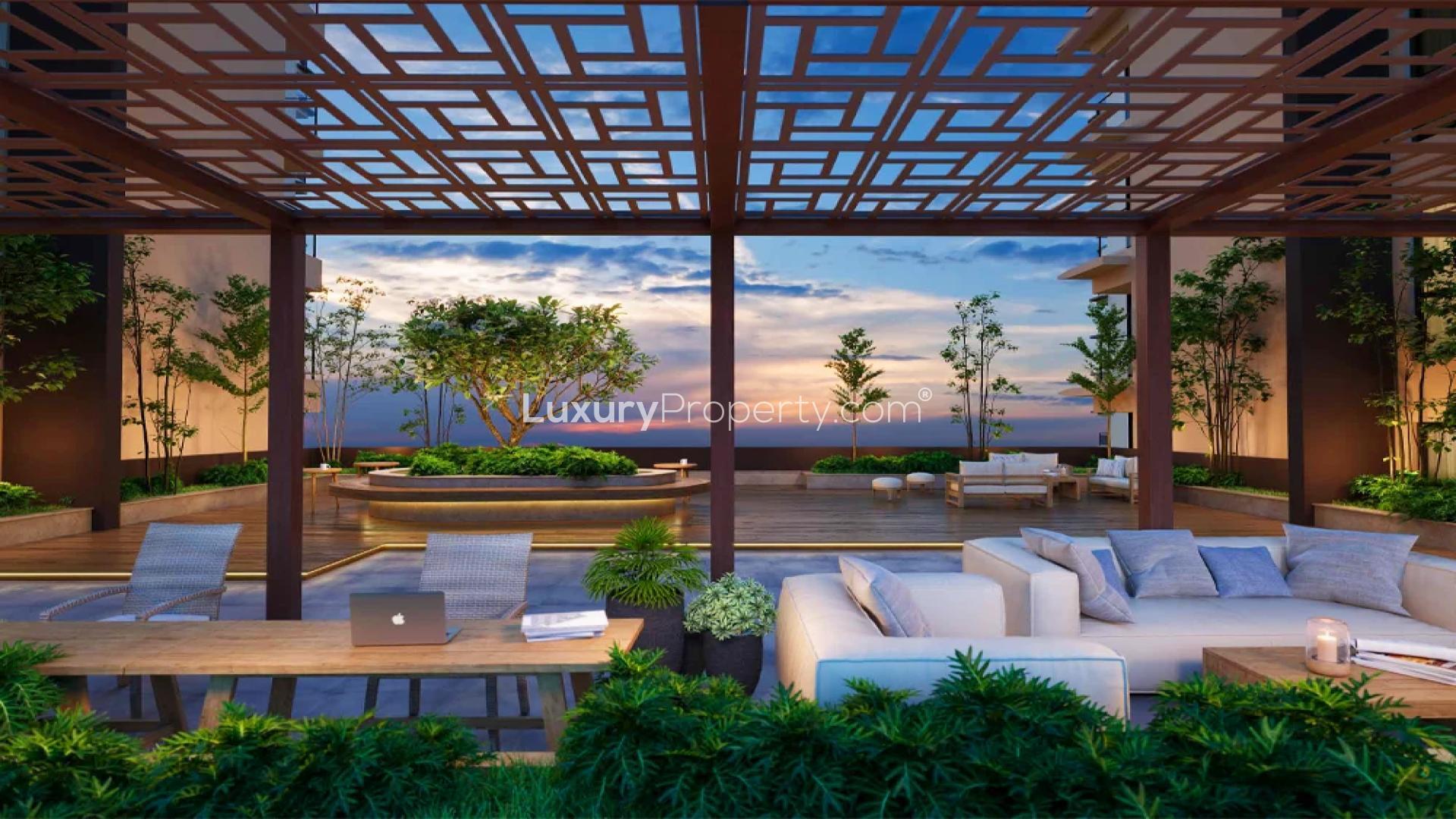 Luxurious living room in SOBHA Elysia apartment, featuring modern decor and spacious layout