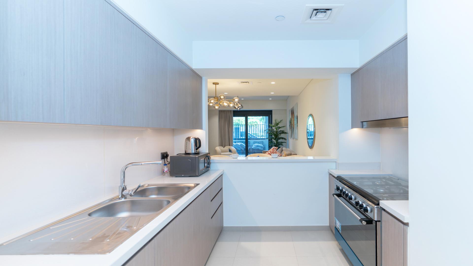 Modern living room in duplex apartment, Downtown Dubai, with stylish decor and bright lighting