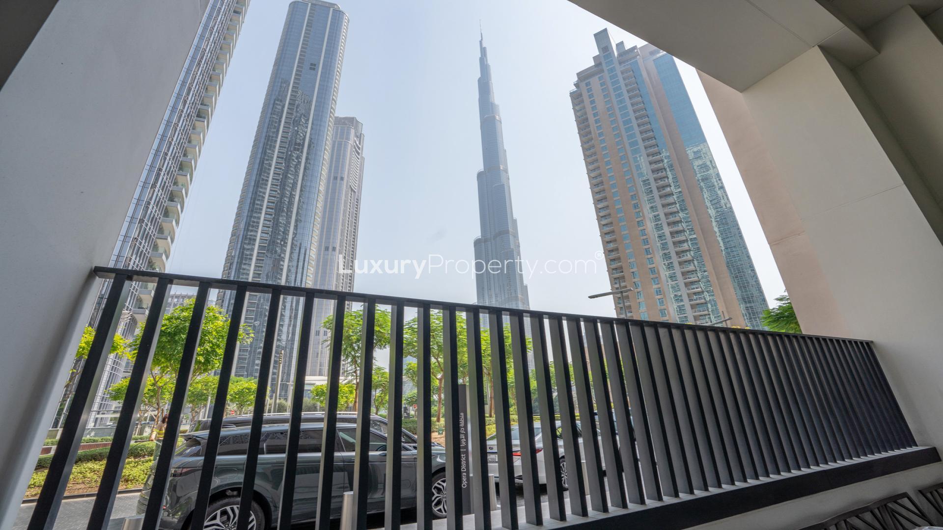 Modern living room in Downtown Dubai duplex, elegant decor, spacious layout, terrace view