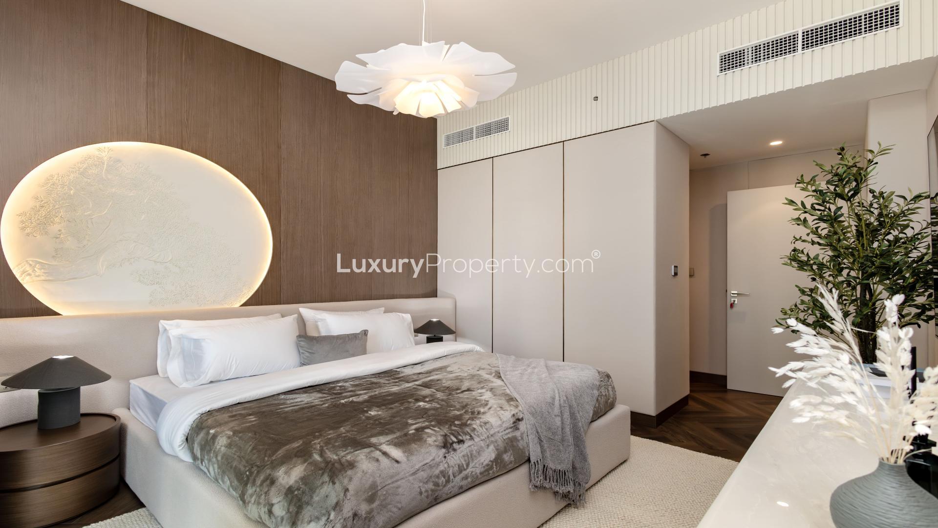 Beachfront apartment view in Emaar Beachfront, Beach Isle, showcasing ocean and city skyline