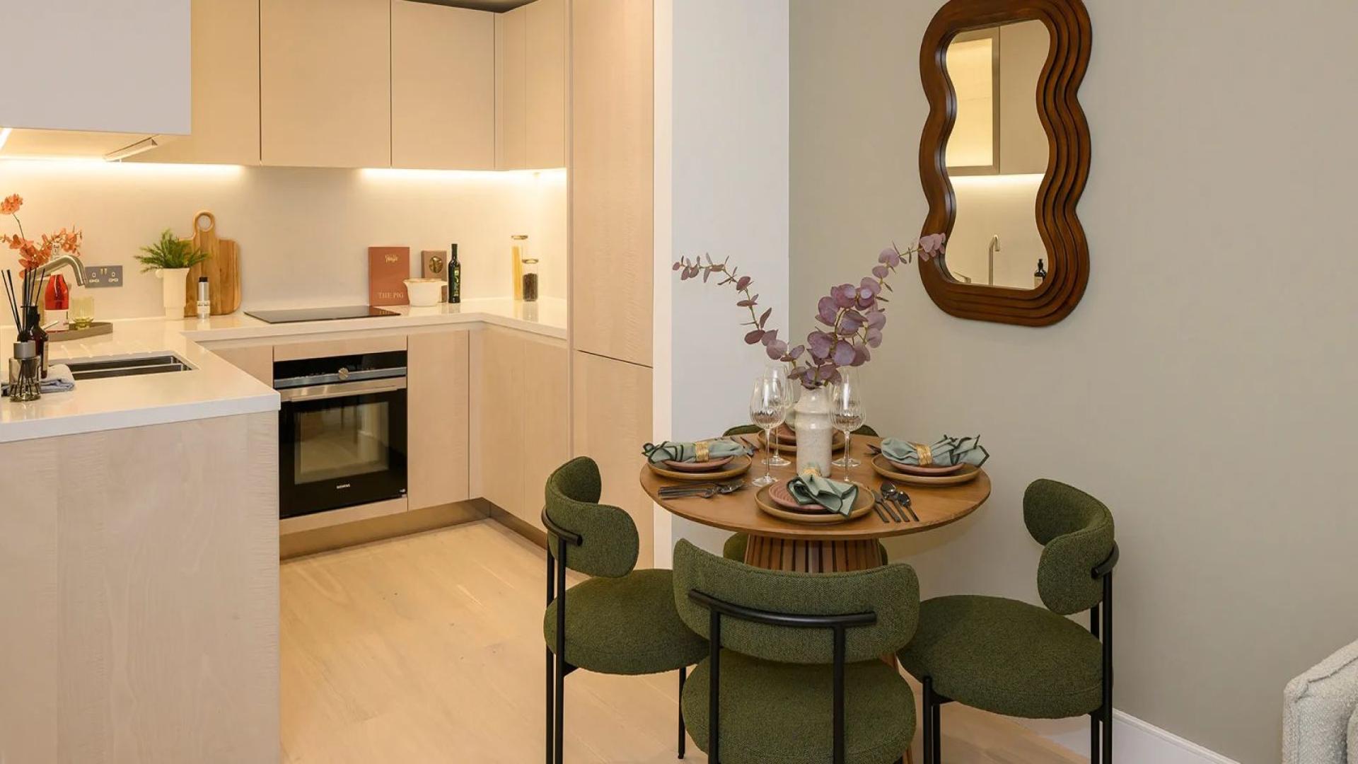 Outdoor garden view at Prince of Wales Drive apartment, London, with seating area