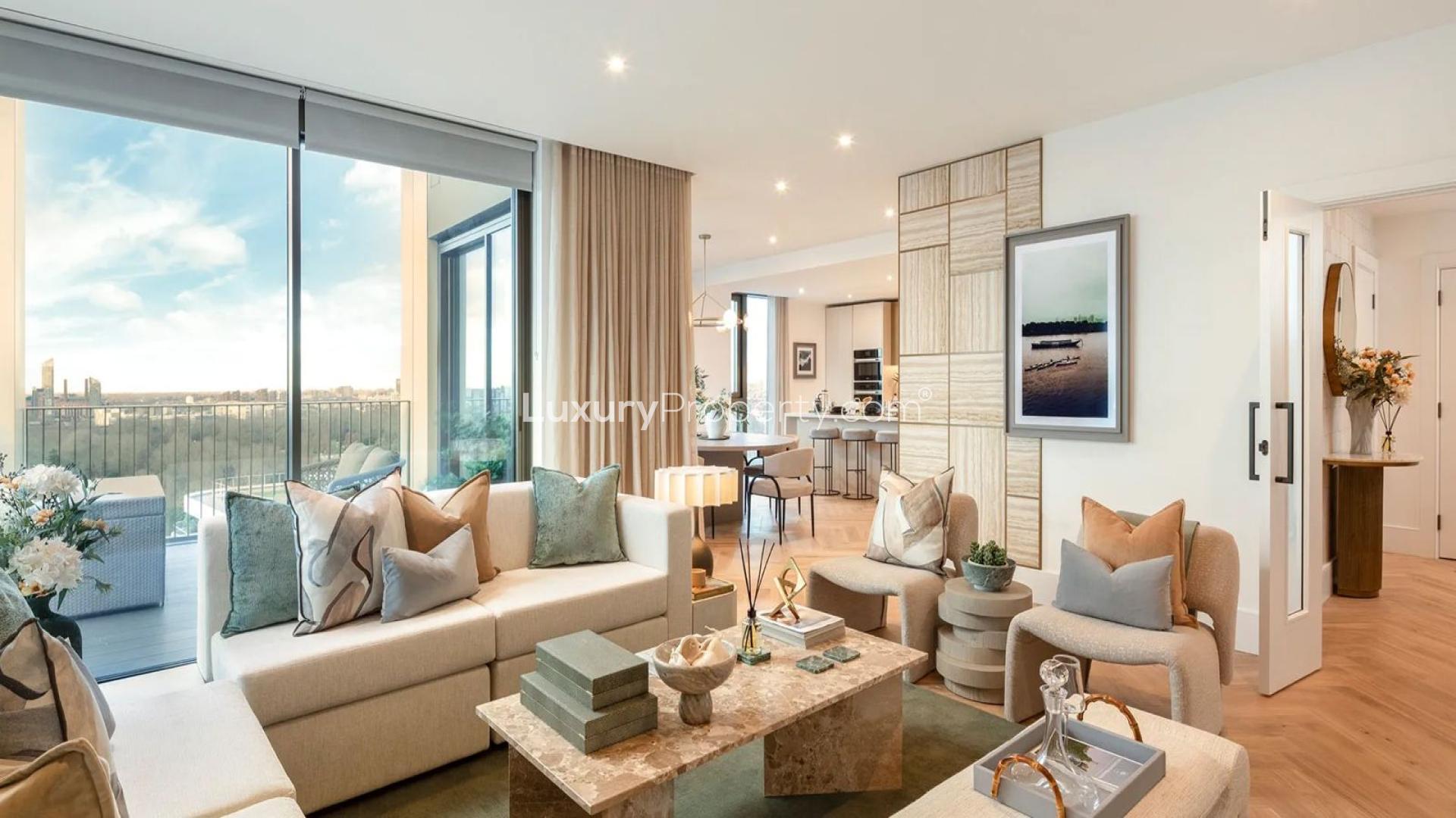 "Modern kitchen and dining area in Prince of Wales Drive apartment, London.",Luxurious living room with garden views in Prince of Wales Drive apartment, London