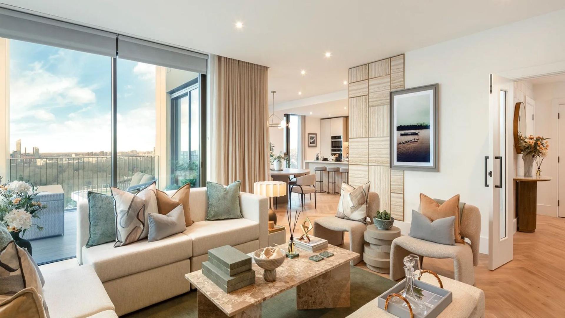 "Modern kitchen and dining area in Prince of Wales Drive apartment, London.",Luxurious living room with garden views in Prince of Wales Drive apartment, London
