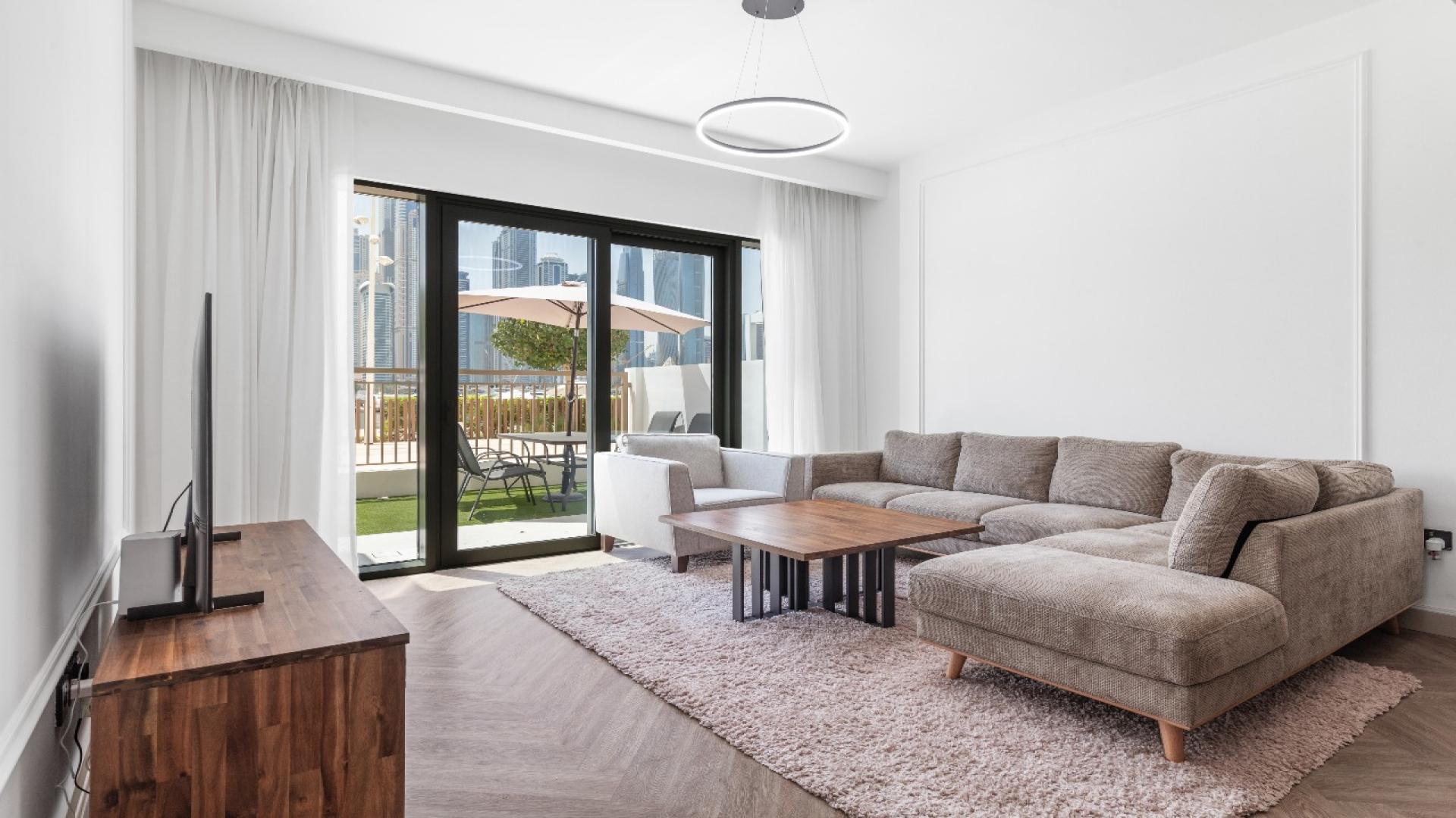 Balcony view of Dubai Marina skyline from Emaar Beachfront Marina Vista apartment for sale