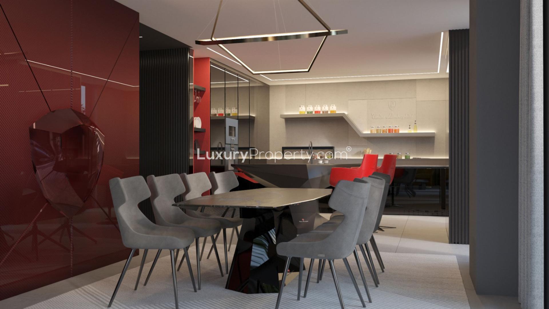 Modern living room in Nad Al Sheba First apartment, featuring stylish decor and large windows