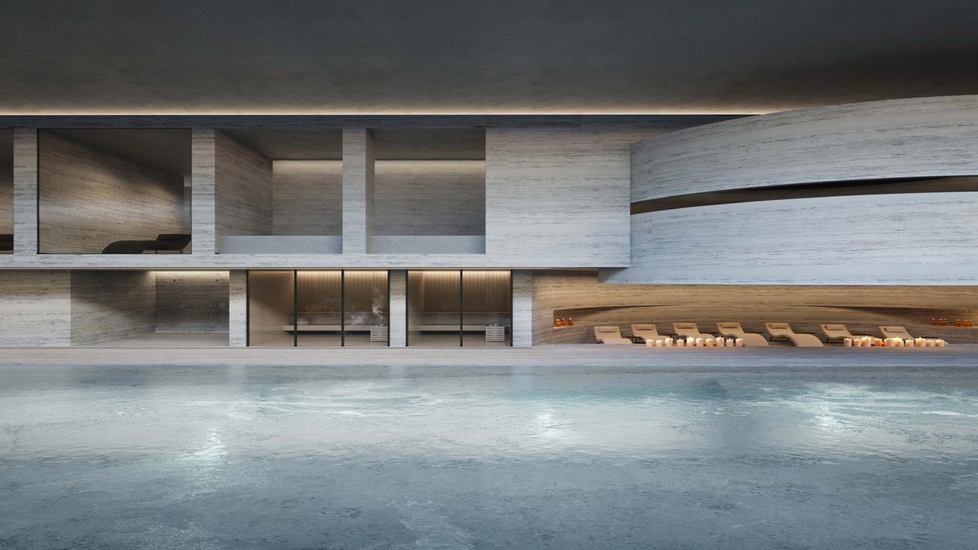 Modern architecture at Akala Hotel and Residence, DIFC, with elegant outdoor seating area