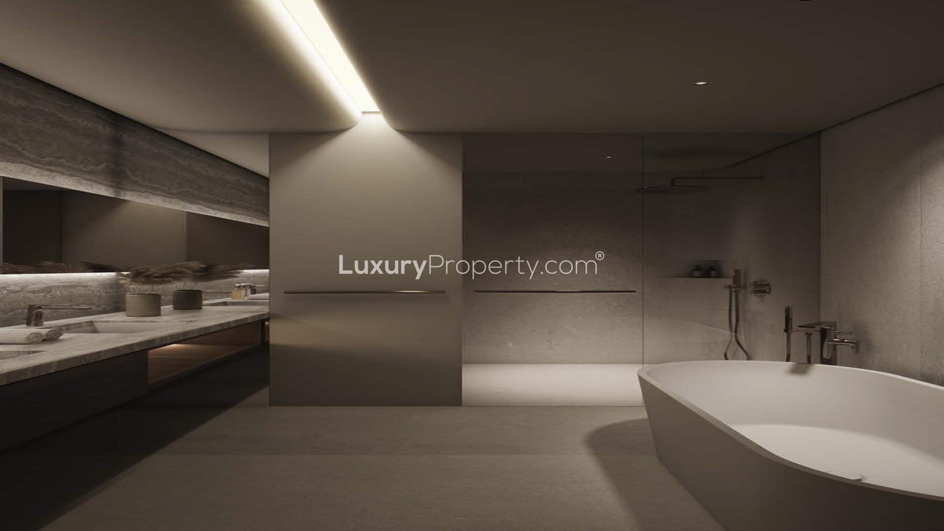 Modern living room with city skyline view in Zabeel 2, Akala Hotel Residences