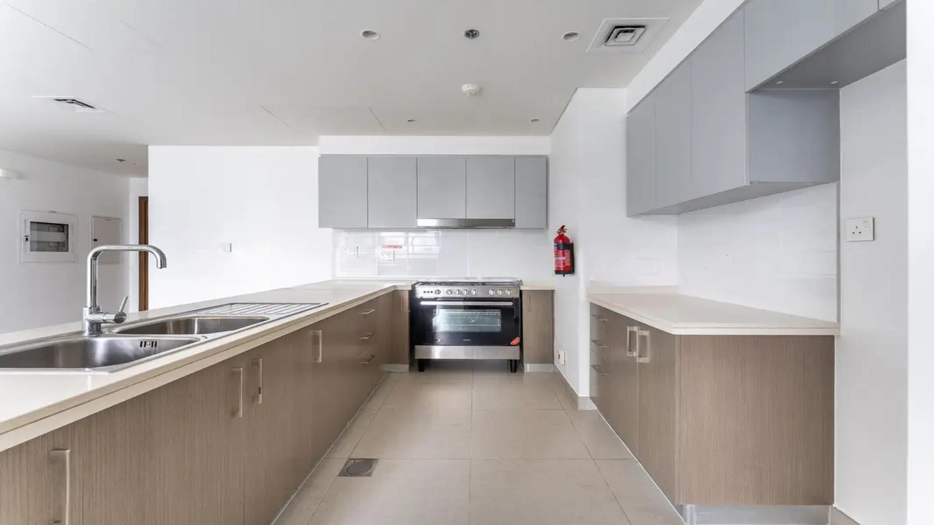 Modern kitchen in three-bedroom apartment for sale, Forte 1, Downtown Dubai