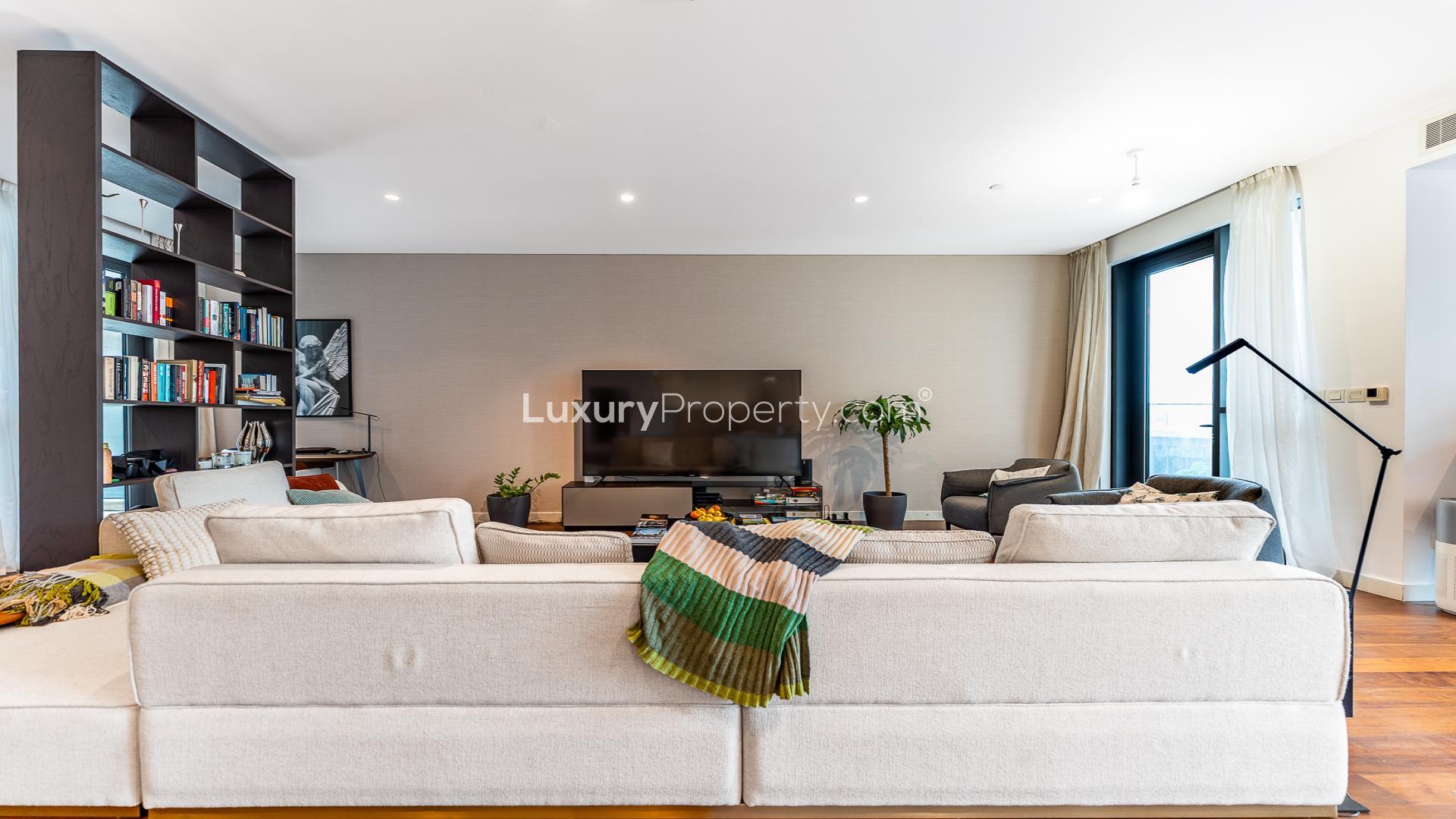 Modern living room and kitchen in City Walk apartment, Building 13B, for sale