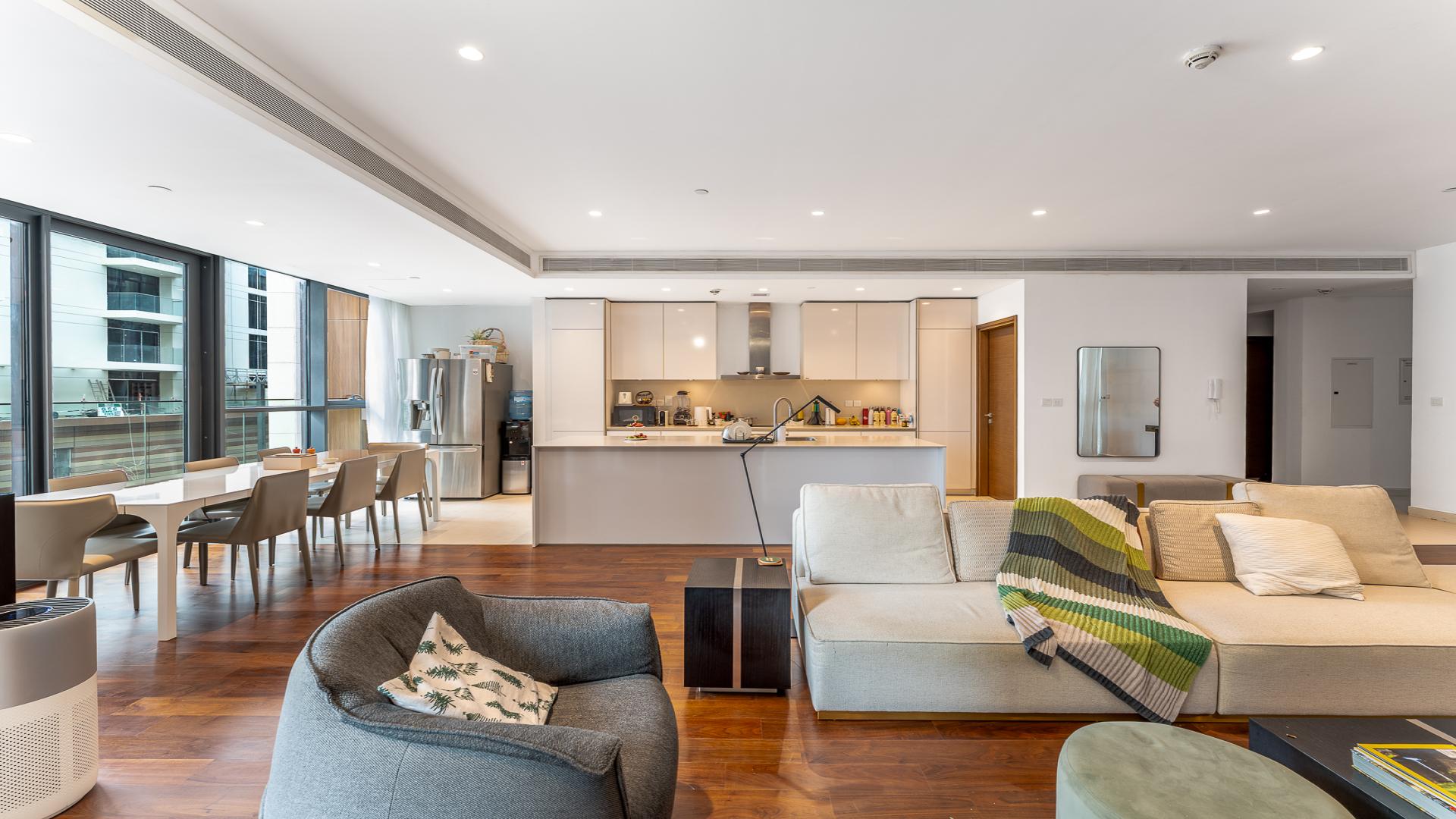 Modern open-plan living room and kitchen in City Walk apartment, Building 13B, for sale