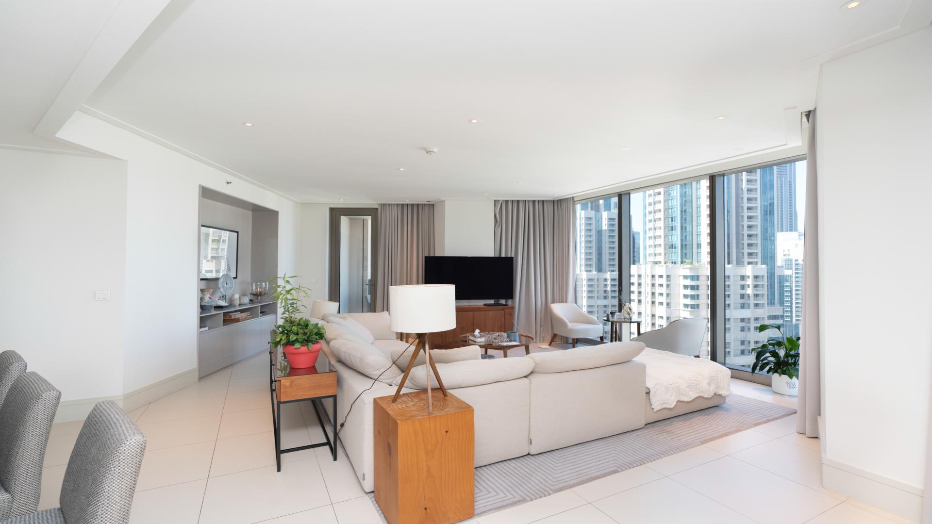 Modern kitchen and living area with Burj Khalifa views, Vida Residence Downtown Dubai