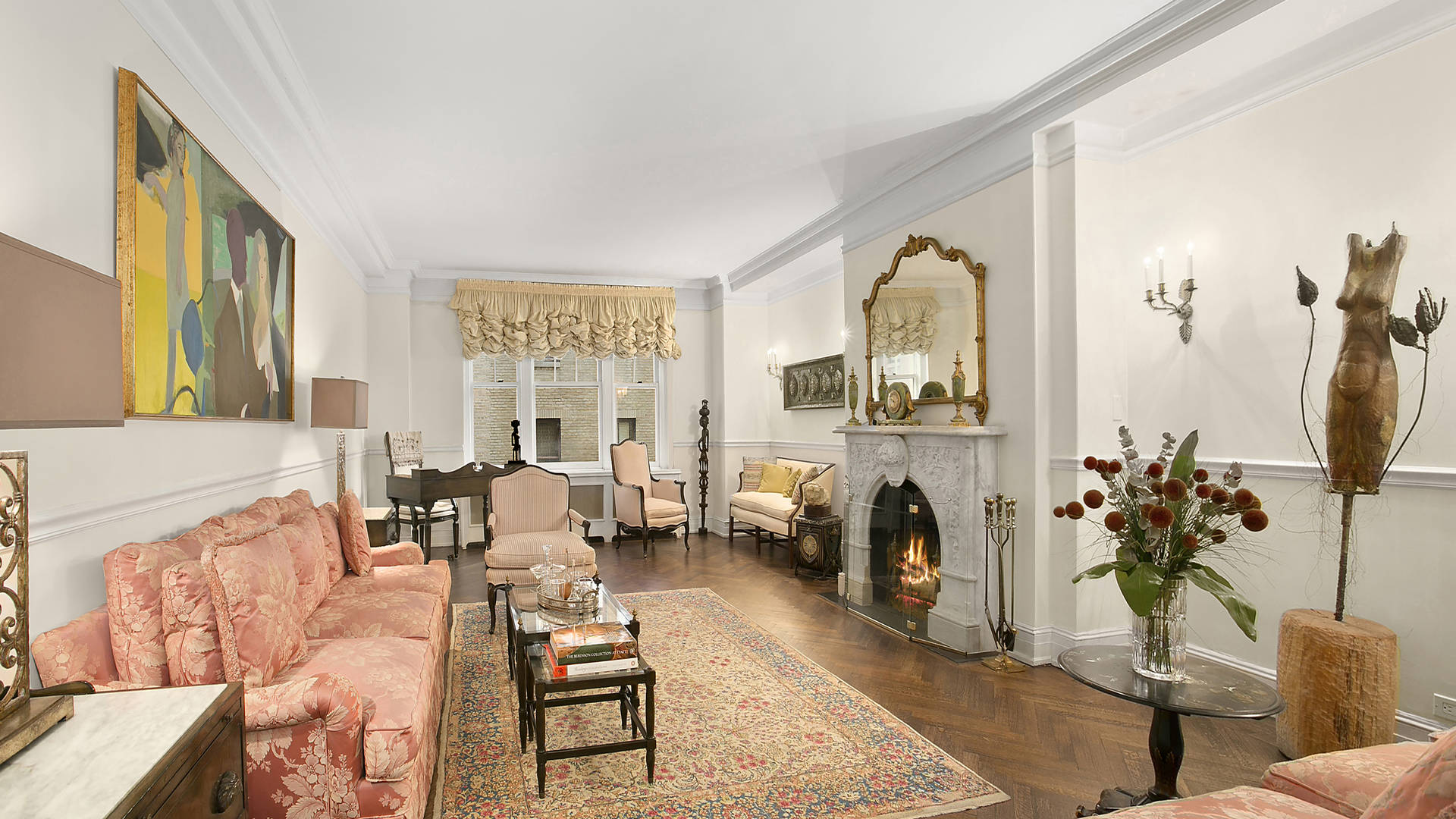 Elegant living room in Manhattan luxury apartment with classic decor and fireplace