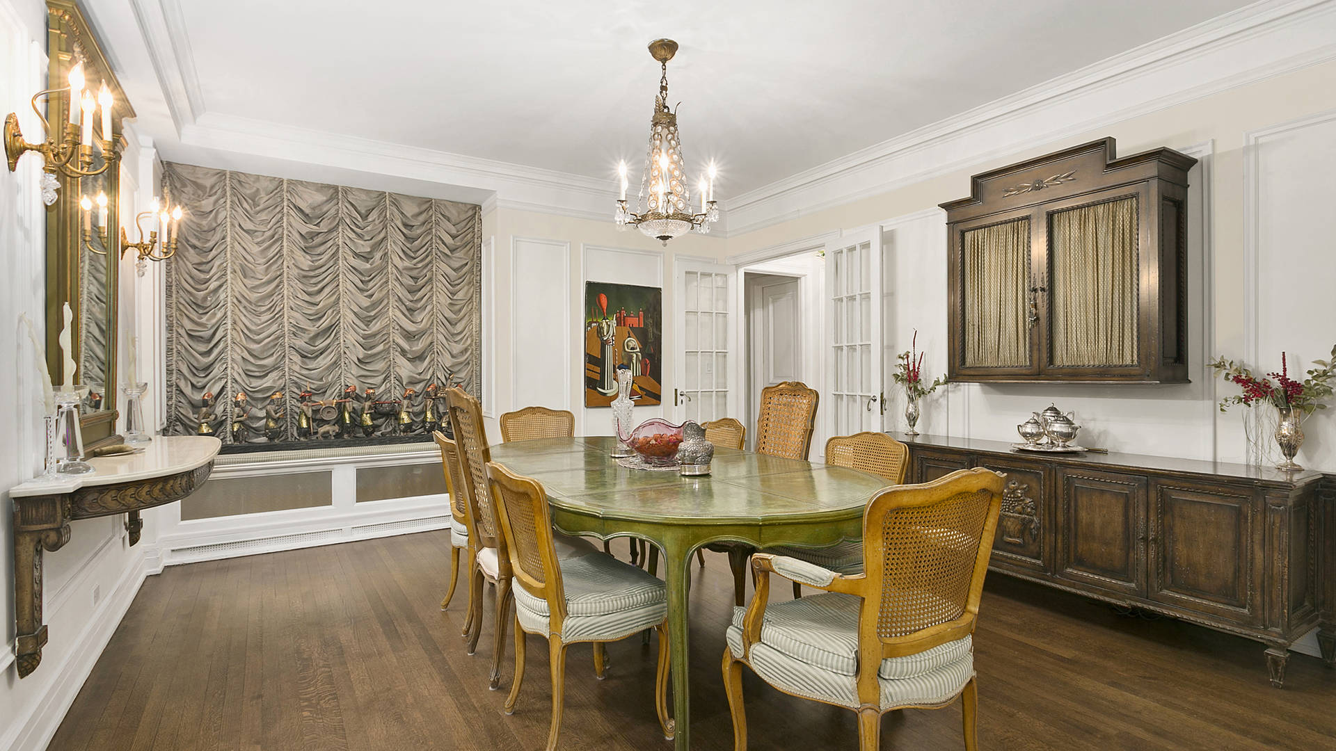 Luxurious Manhattan apartment living room with elegant decor, fireplace, and art pieces