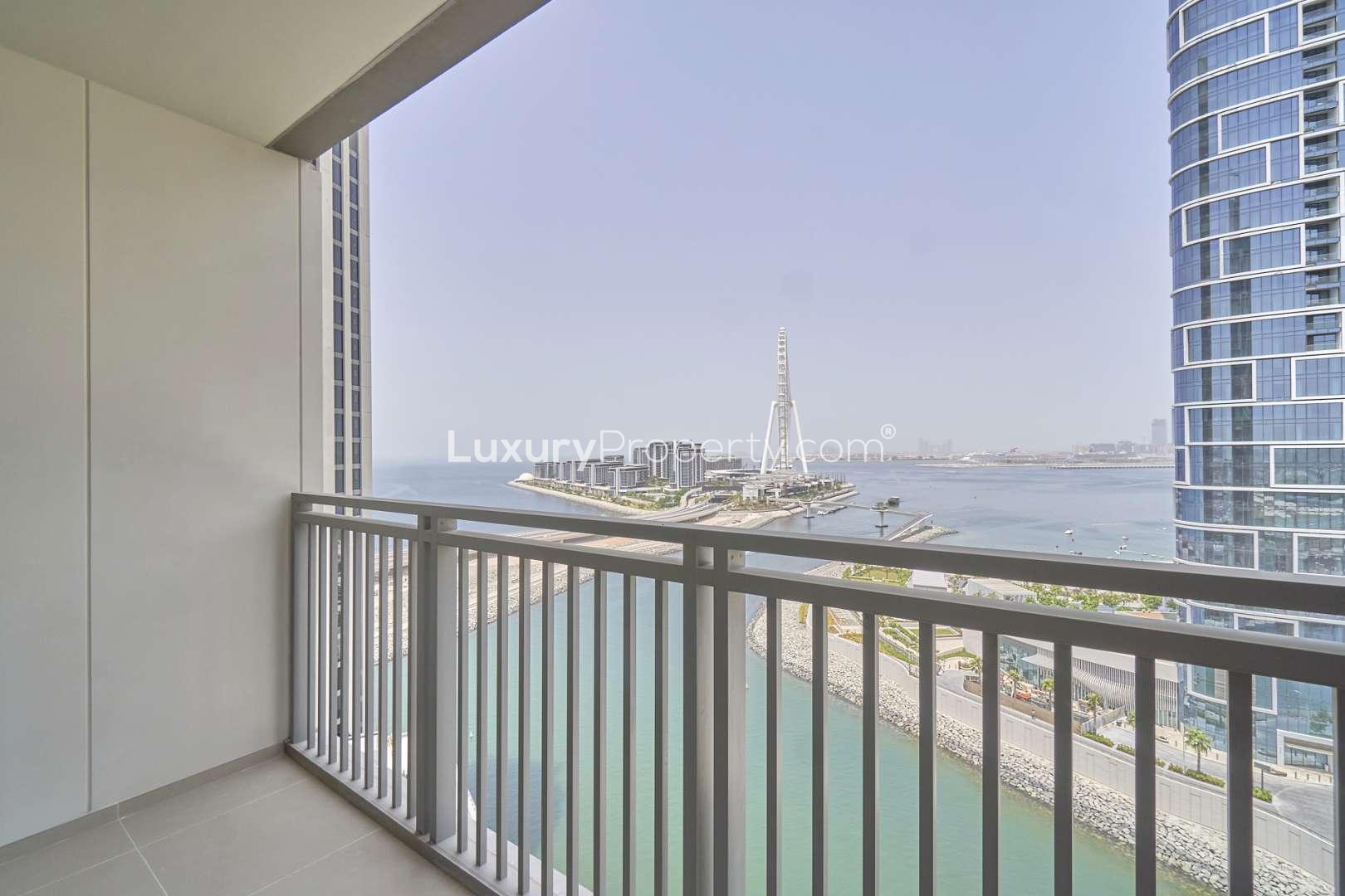 Spacious living room with balcony view in 3-bedroom apartment, 52|42 Dubai Marina