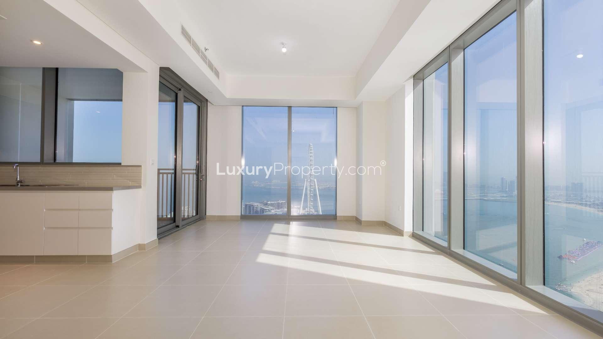 Aerial view of Dubai Marina beach and skyline near 5242 community apartment for rent