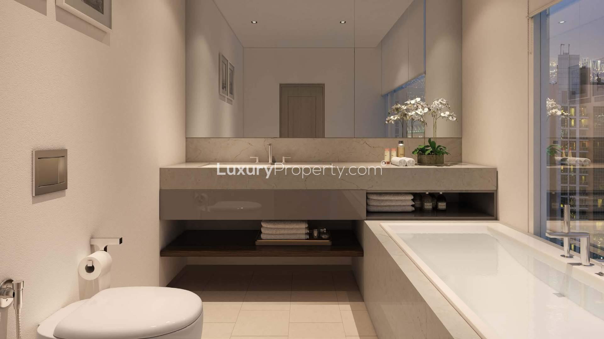 Luxurious bedroom with city view in Act One Act Two Towers, Downtown Dubai apartment