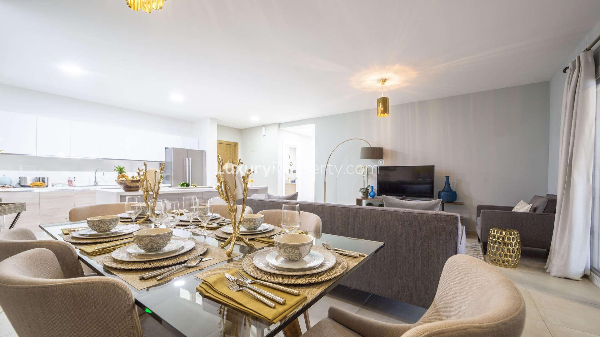 Hallway leading to modern kitchen in Al Andalus, Jumeirah Golf Estates apartment for sale