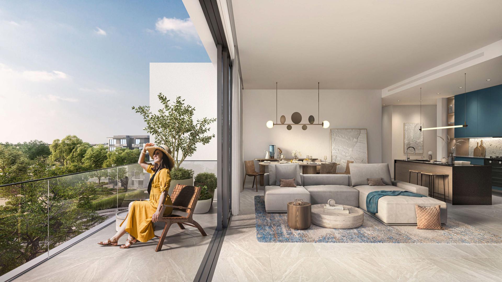 Modern living room in 3-bedroom duplex, Ghaf Woods, Dubai Land, with elegant decor and natural light