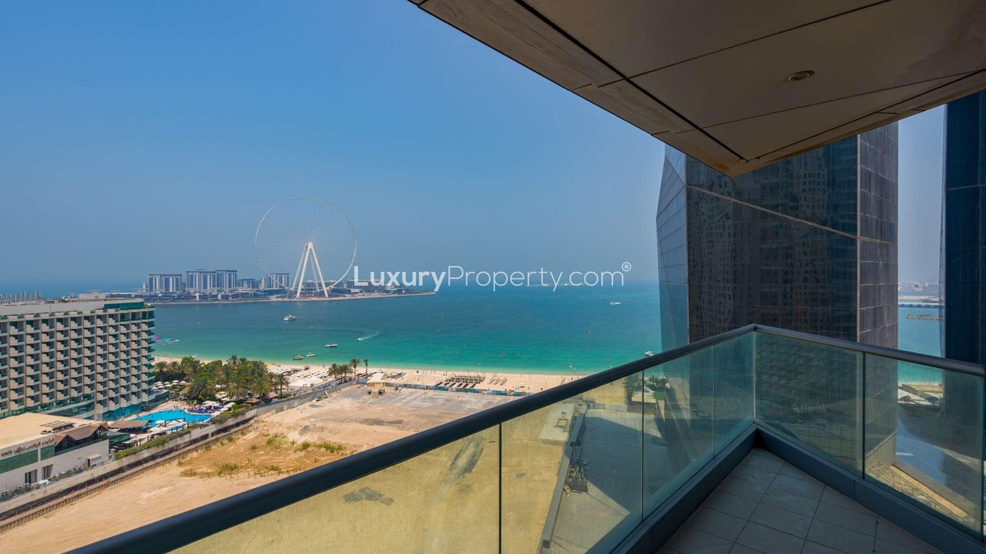 Balcony view from three-bedroom apartment in Al Fattan Marine Towers, JBR, overlooking the beach
