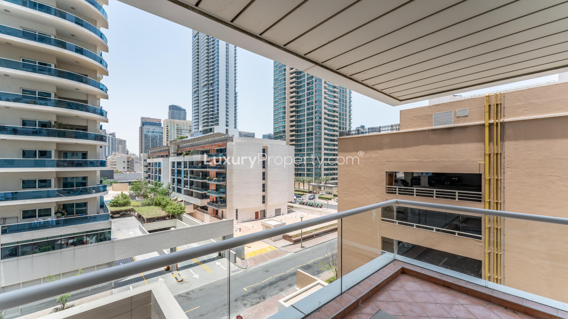"Spacious living area in upgraded 3-bed apartment, La Riviera, Dubai Marina, for sale.",Balcony view from upgraded 3-bed apartment for sale in La Riviera, Dubai Marina