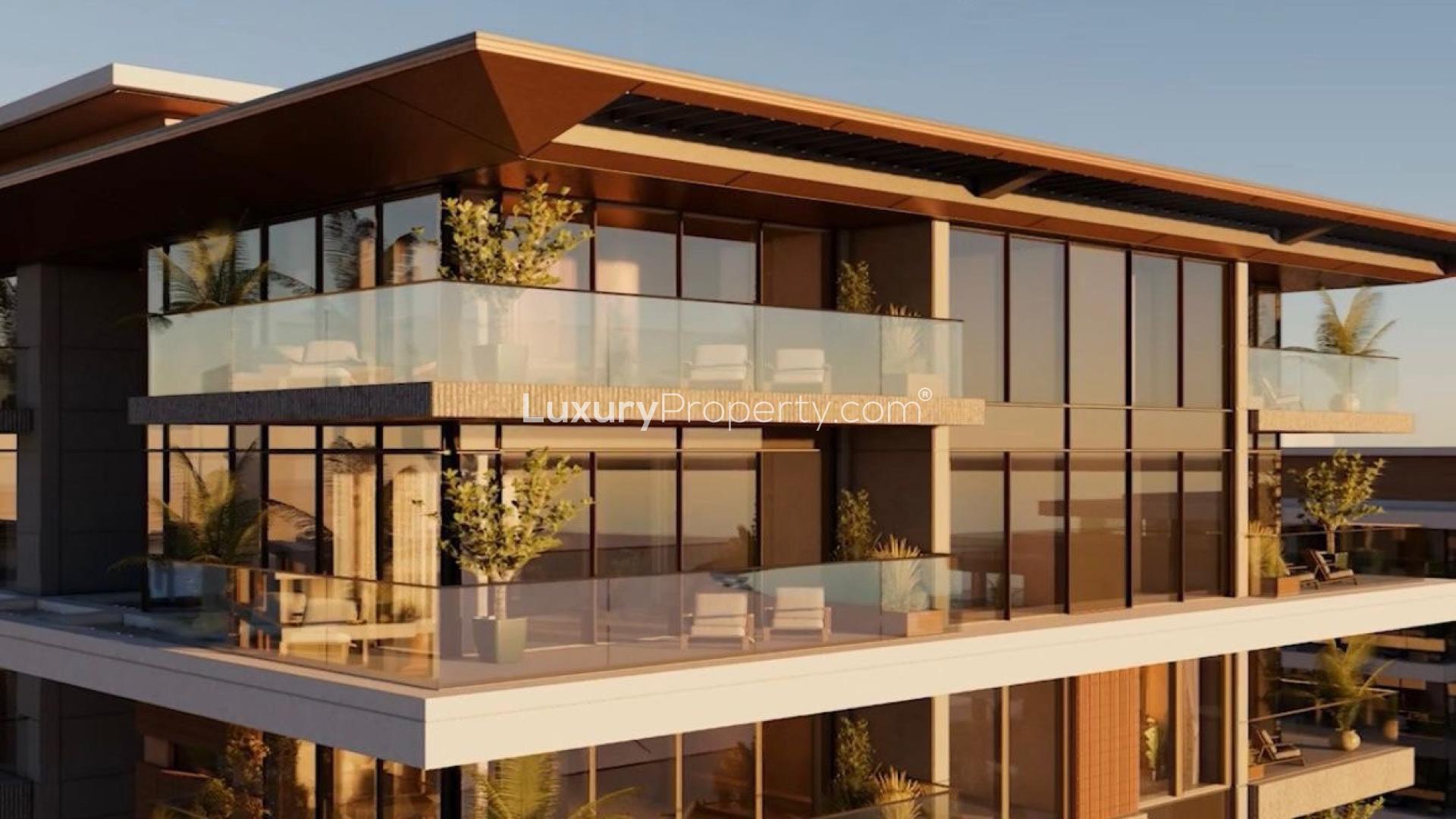 Panoramic sea view from modern apartment in Ellington Cove, Dubai Islands, at sunset