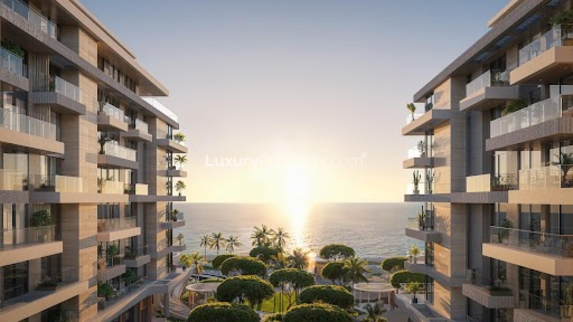 Panoramic sea view apartment buildings with pool in Ellington Cove, Dubai Islands