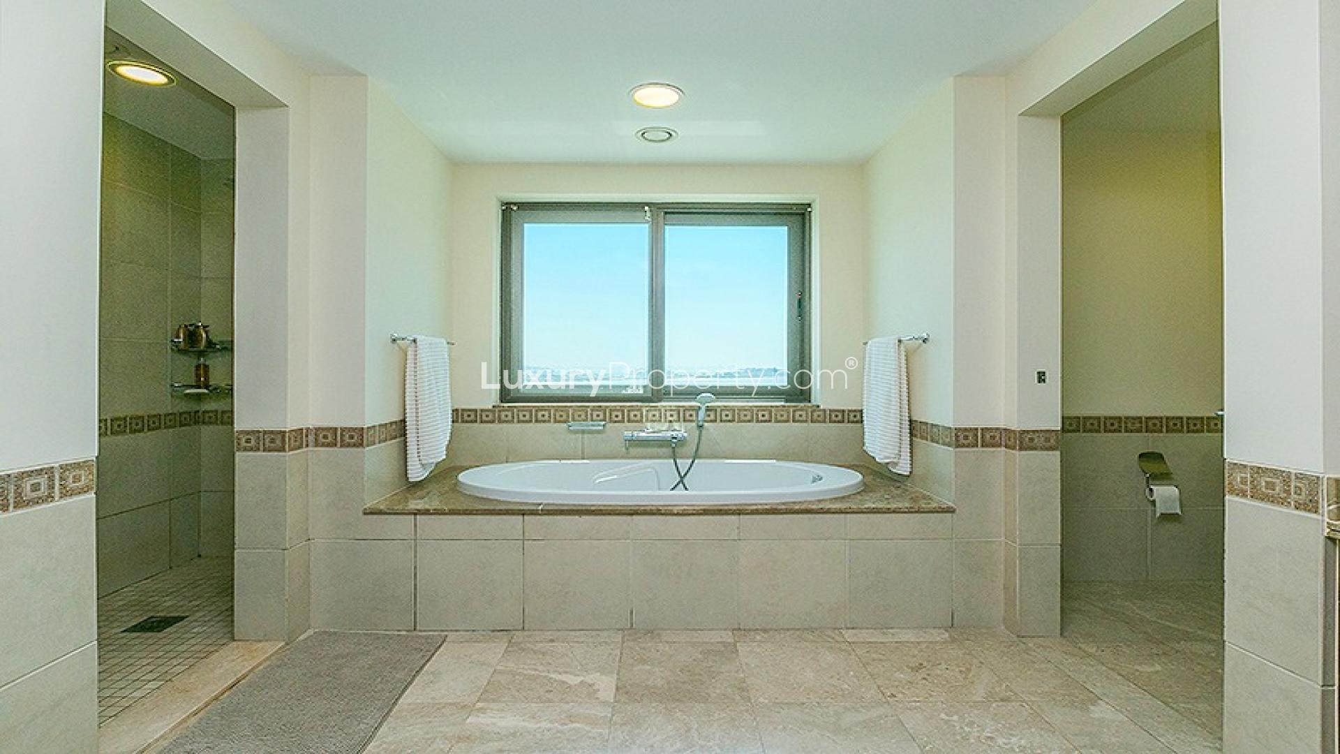 Luxurious living room in Palm Jumeirah apartment with modern decor and stunning sea views