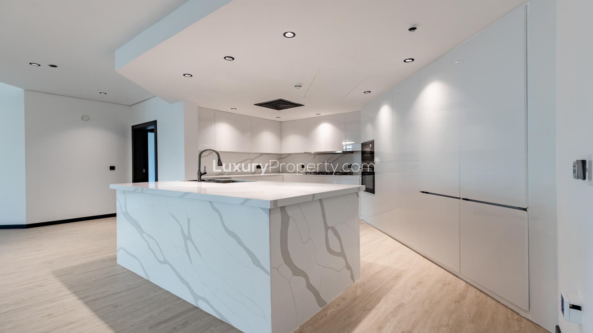 Fully upgraded modern kitchen in Shoreline Apartments, Palm Jumeirah, featuring sleek countertops