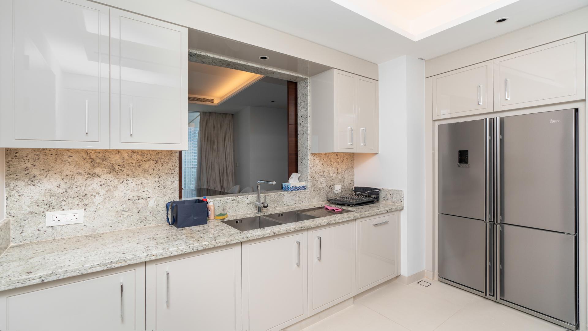 High-floor furnished apartment living room with city views in The Address Sky View, Downtown Dubai