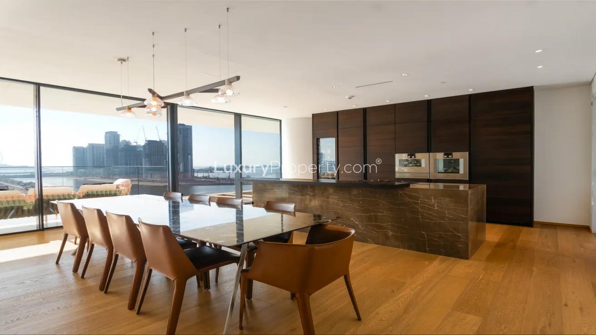 Modern living room in luxury Palm Jumeirah apartment, featuring stylish furniture and open layout