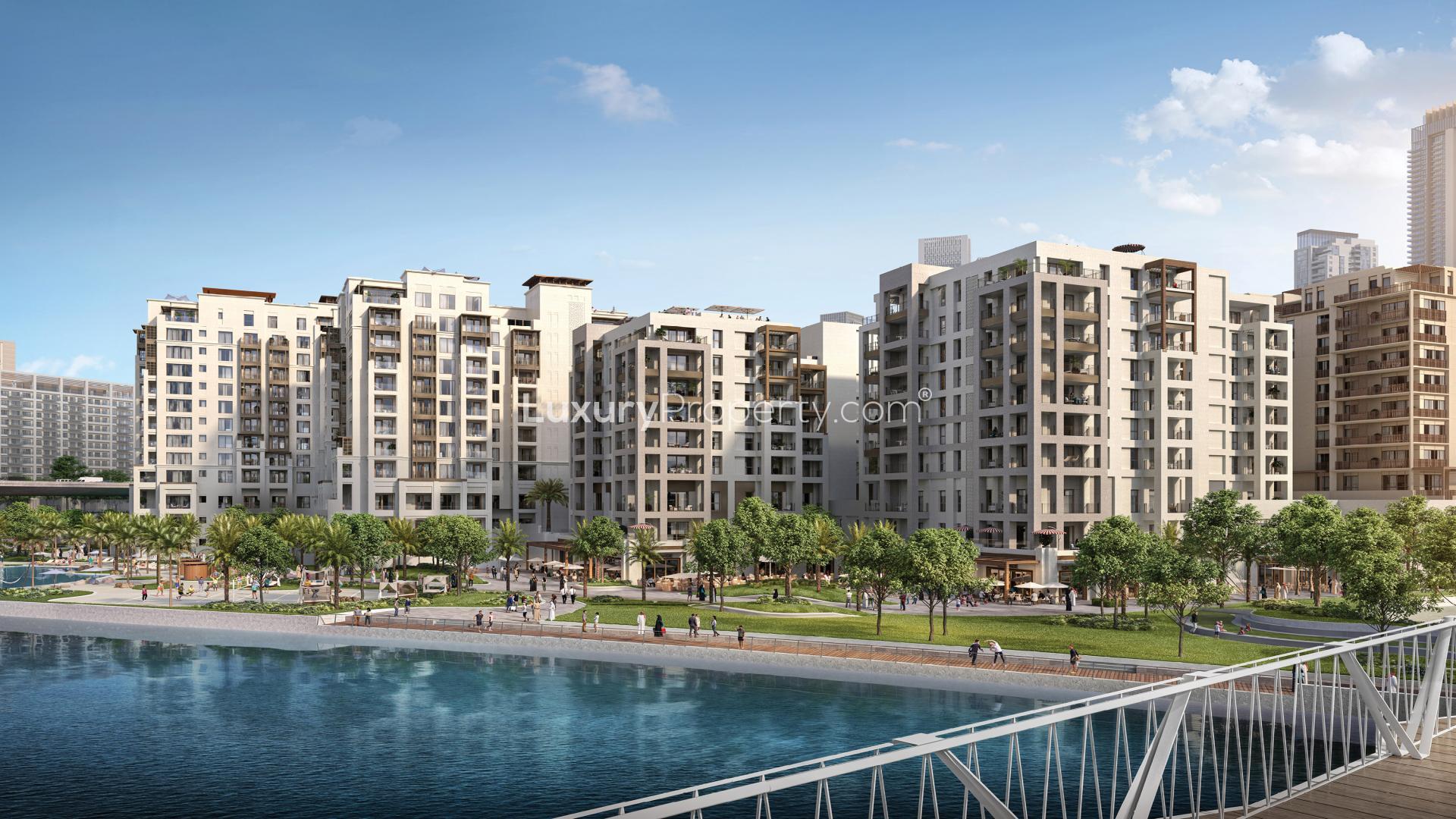 Elegant living room in 3-bedroom apartment, Dubai Creek Harbour, featuring modern decor and large windows