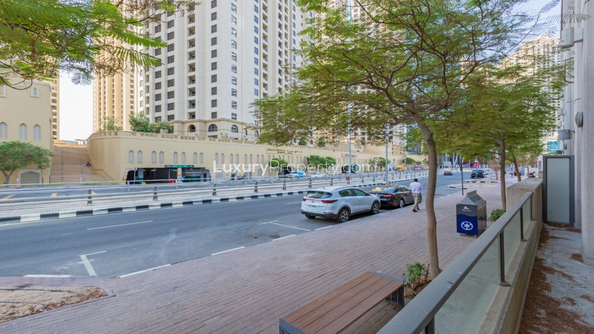 Spacious living area with large windows in Marina Quays apartment, Dubai Marina for sale