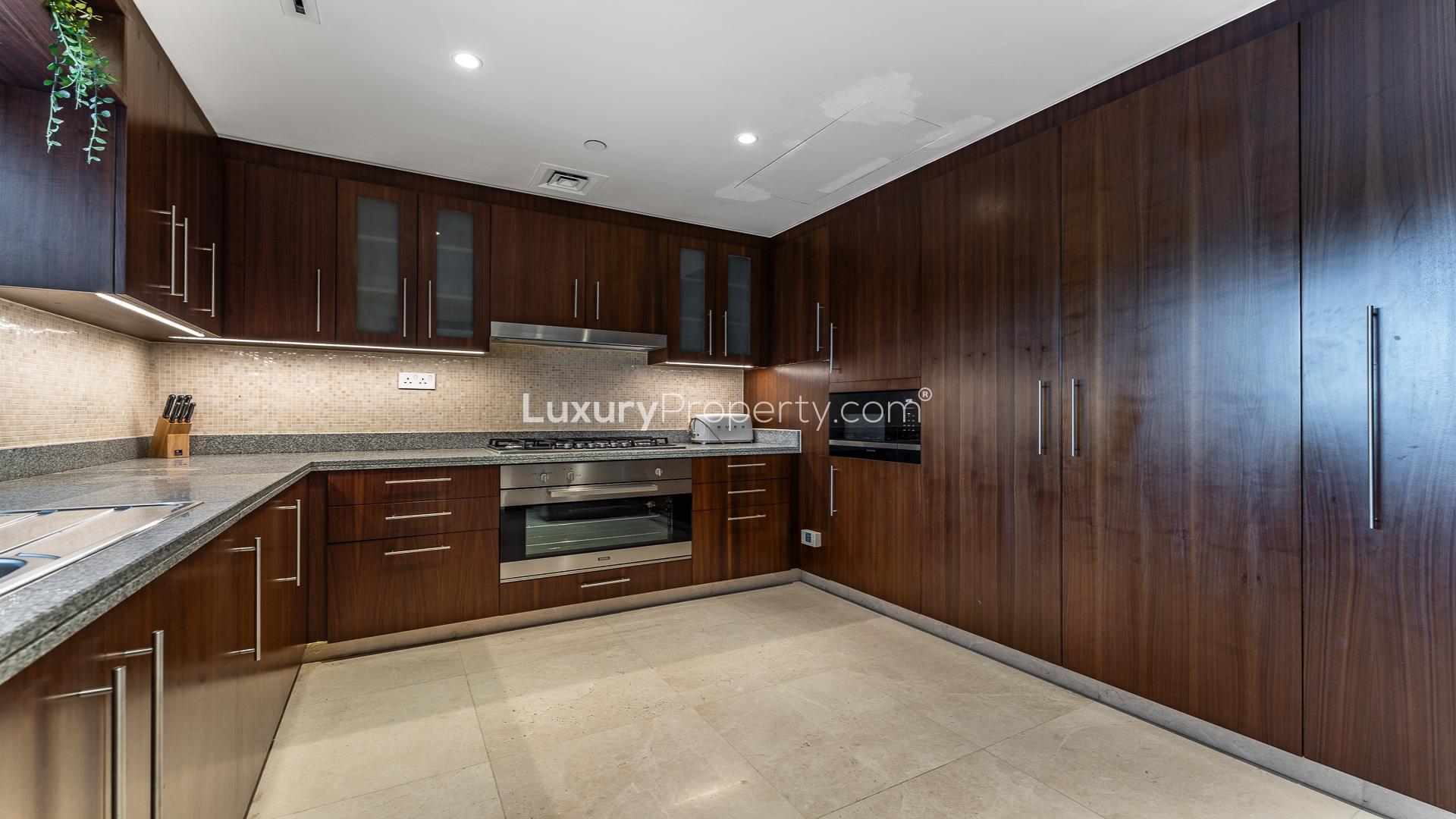 Spacious living area in Downtown Dubai apartment with modern design and large windows