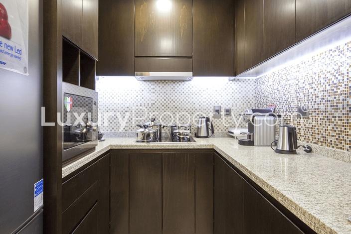 Spacious living room in 3-bed apartment at Balqis Residence, Palm Jumeirah, for sale