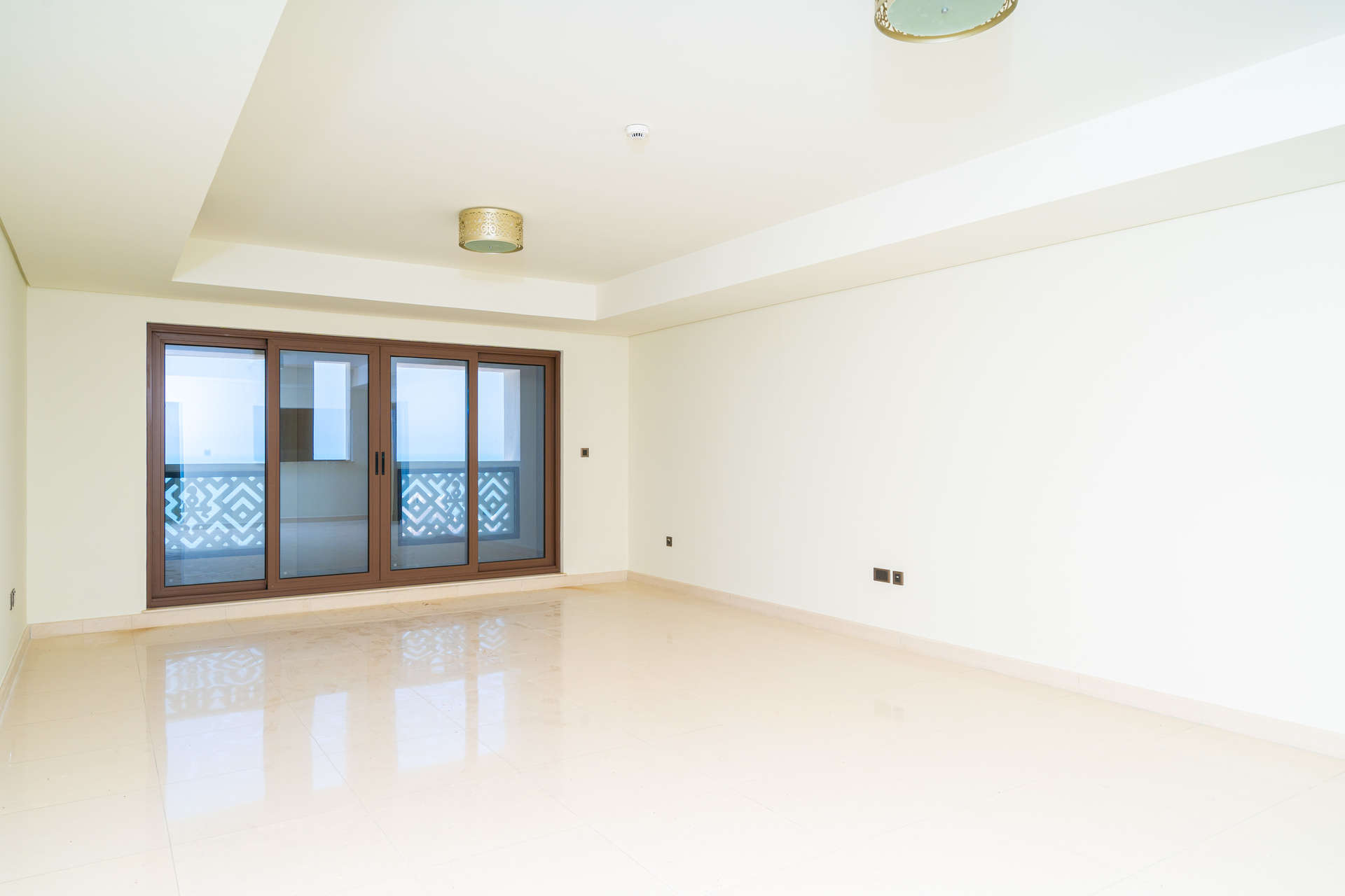 Empty living room with sea view in Balqis Residence apartment, Palm Jumeirah