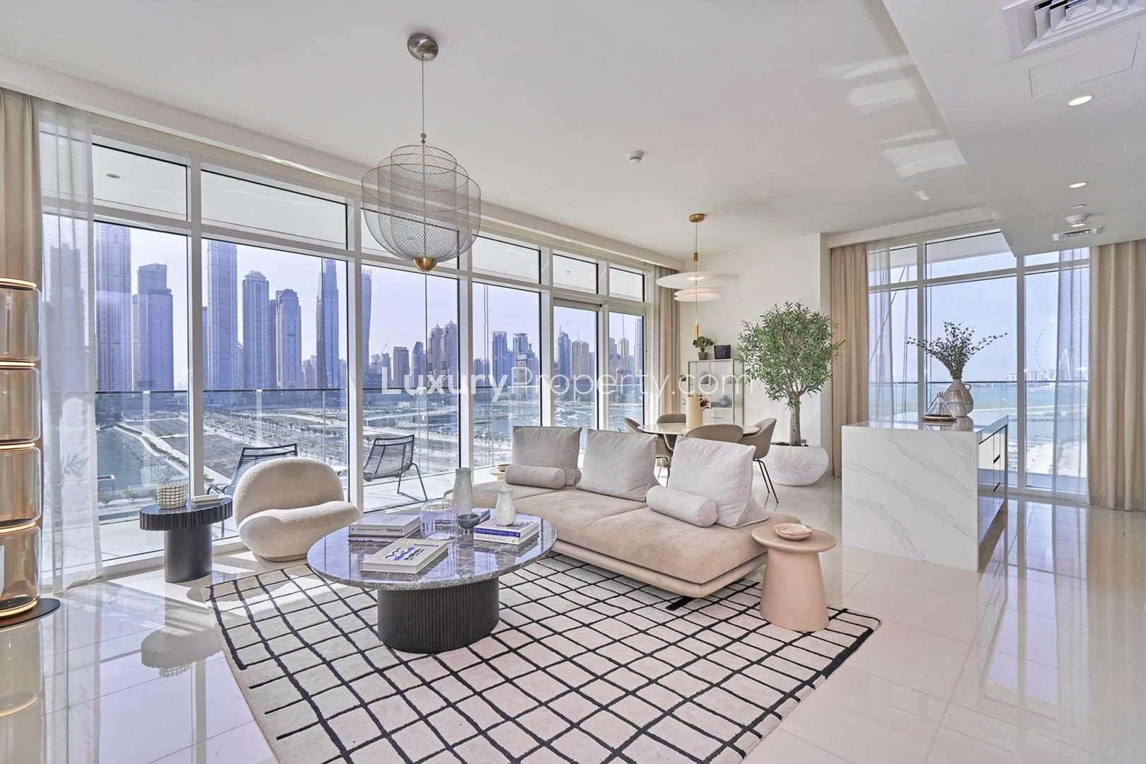 "Modern living room with sea view in Beach Isle apartment, Emaar Beachfront, Dubai Harbour.",Luxurious living room in Beach Isle apartment with stunning Dubai Harbour views
