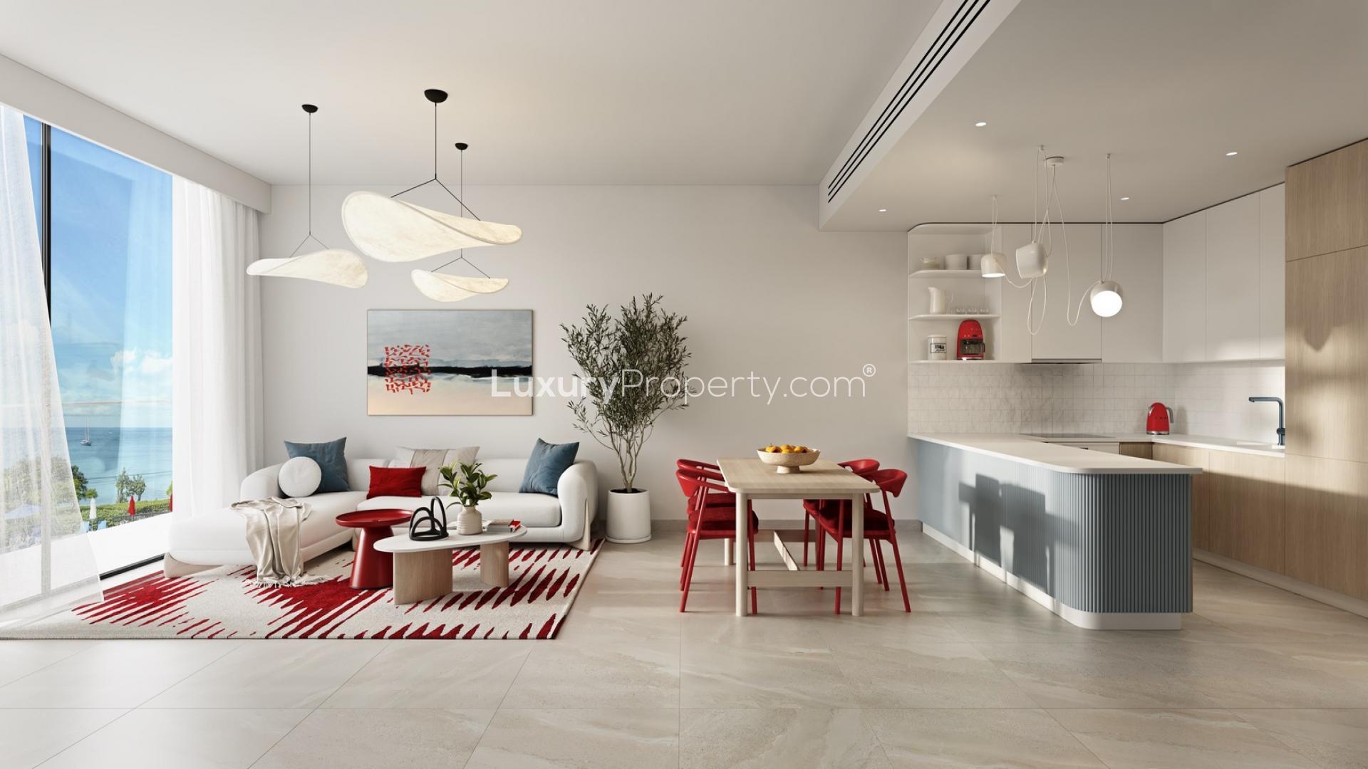 Modern open-plan living and dining area in Al Marjan Island apartment, Rosso Bay Residences