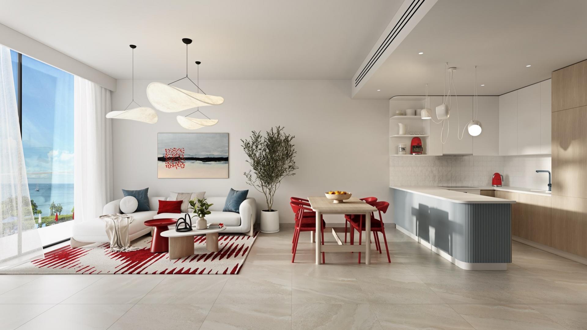 Modern open-plan living and dining area in Al Marjan Island apartment, Rosso Bay Residences