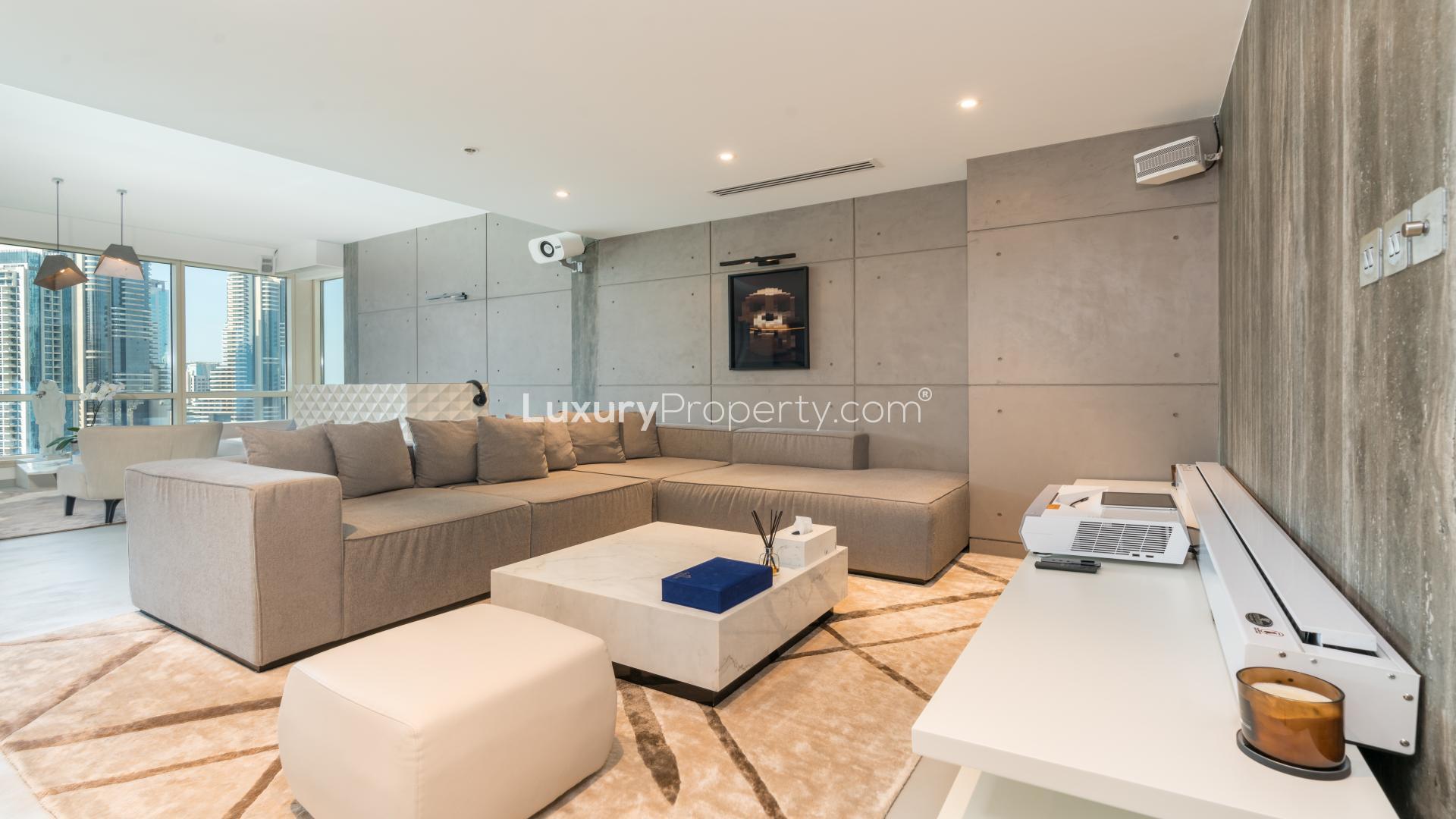 Modern Dubai Marina apartment living room with full marina view and stylish interior design