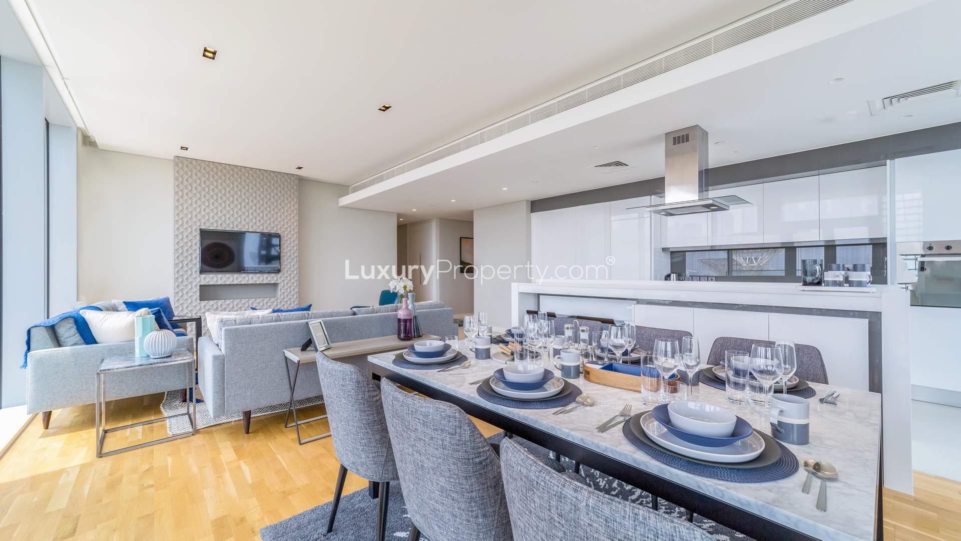 Luxurious living room in Bluewaters three-bedroom apartment for sale, featuring modern decor