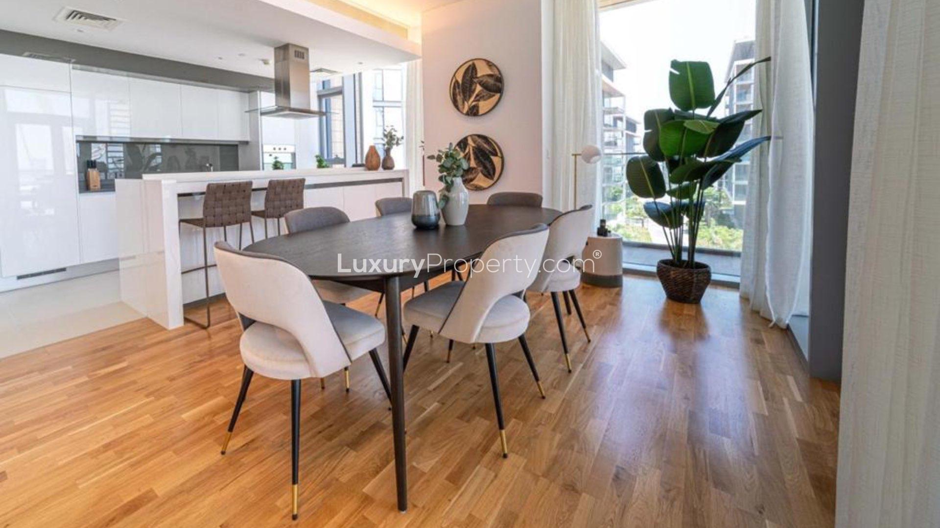 Luxury living room in 3-bedroom apartment, Bluewaters Island, with modern decor and large windows