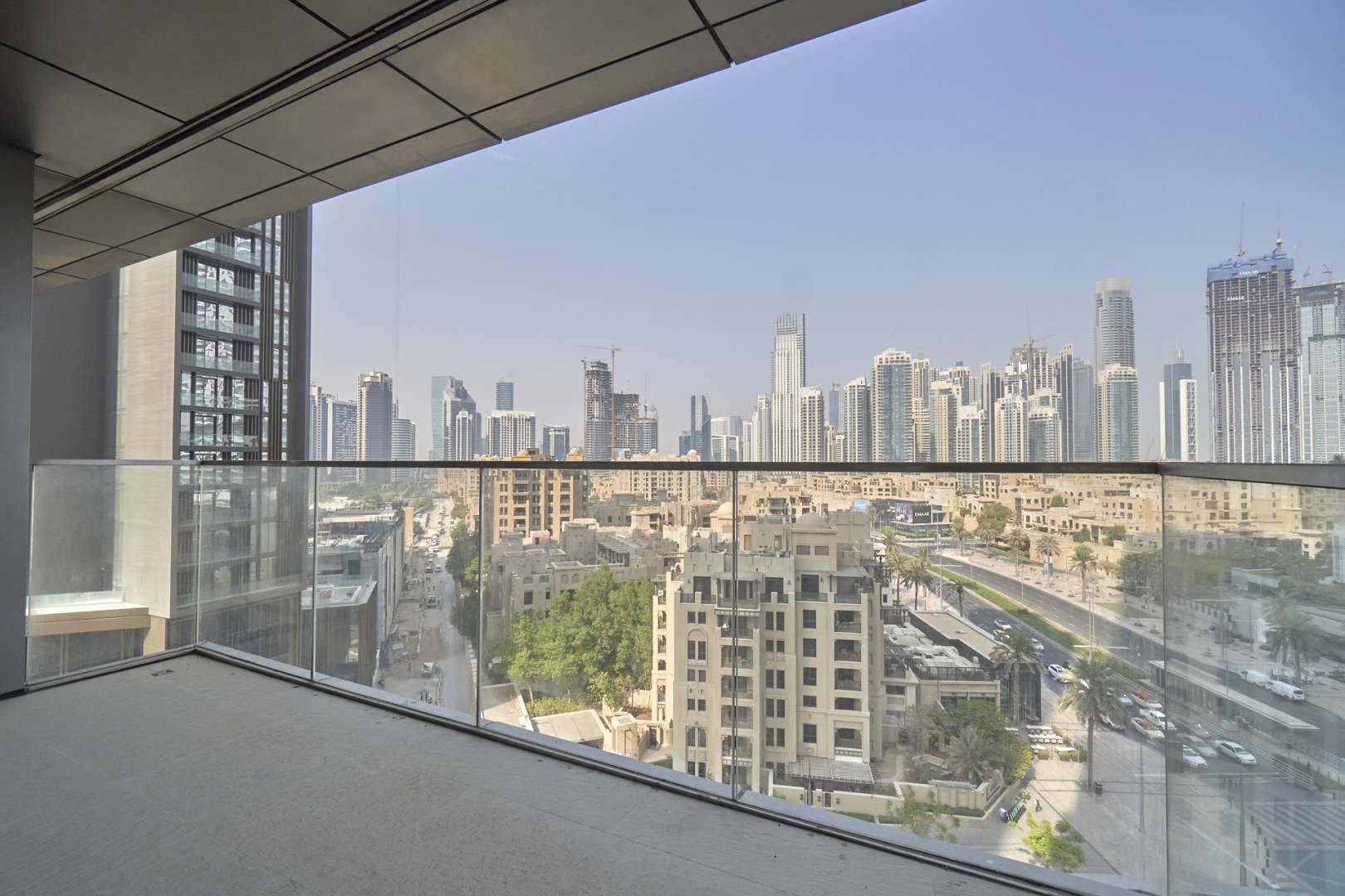 Balcony view from luxury apartment in Boulevard Point, Downtown Dubai, showcasing skyline
