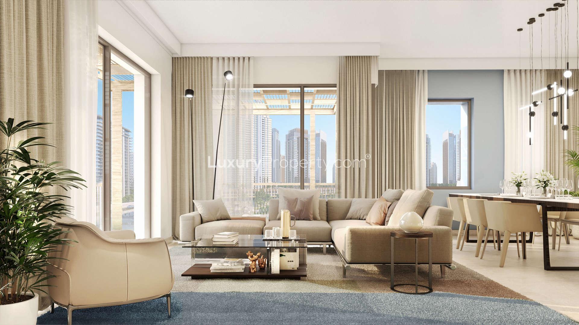 "Stunning beachfront view at Breeze, Creek Beach, Dubai Creek Harbour apartments for sale.","Modern living room in 3-bed apartment at Breeze, Creek Beach, Dubai Creek Harbour.",Modern reception area in Breeze, Creek Beach apartment, Dubai Creek Harbour, featuring stylish decor