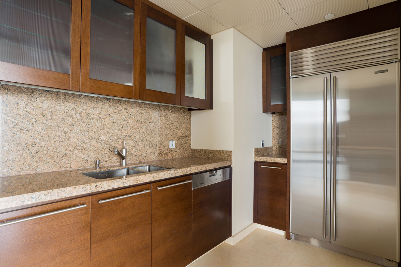 Spacious living area with floor-to-ceiling windows in Burj Khalifa apartment, Downtown Dubai